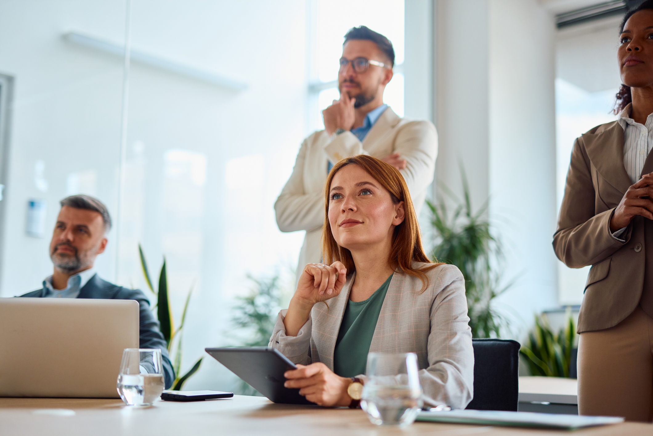 Business team attending a meeting in a modern office